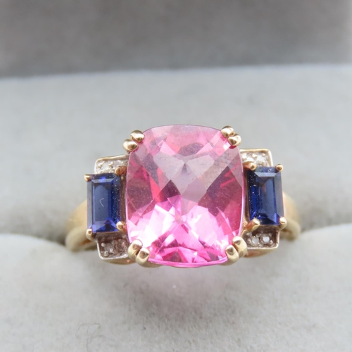 1431 - Pink Tourmaline Iolite and Diamond Set Ladies Ring Mounted in 9 Carat Yellow Gold Ring Size P