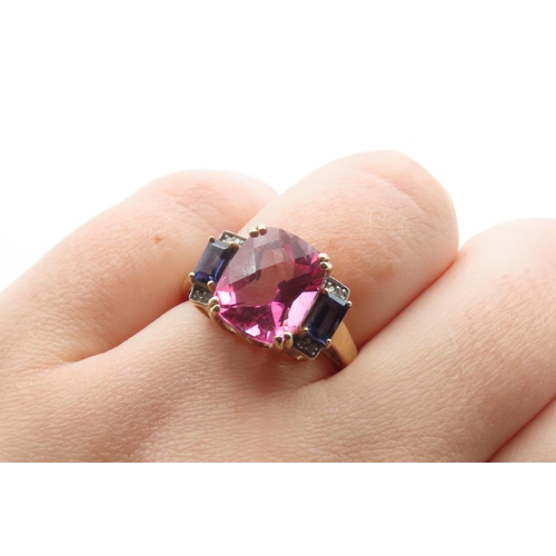 1431 - Pink Tourmaline Iolite and Diamond Set Ladies Ring Mounted in 9 Carat Yellow Gold Ring Size P