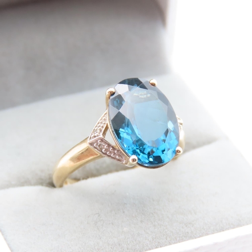 1432 - London Blue Topaz Ring Mounted on 9 Carat Yellow Gold with Further Diamonds Set to Shoulders Ring Si... 