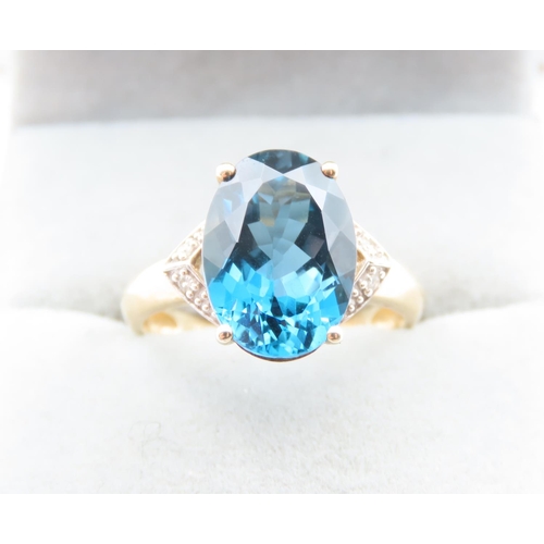 1432 - London Blue Topaz Ring Mounted on 9 Carat Yellow Gold with Further Diamonds Set to Shoulders Ring Si... 