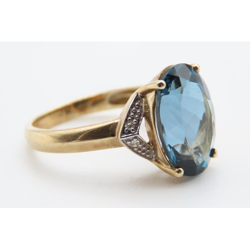 1432 - London Blue Topaz Ring Mounted on 9 Carat Yellow Gold with Further Diamonds Set to Shoulders Ring Si... 