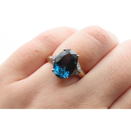 1432 - London Blue Topaz Ring Mounted on 9 Carat Yellow Gold with Further Diamonds Set to Shoulders Ring Si... 