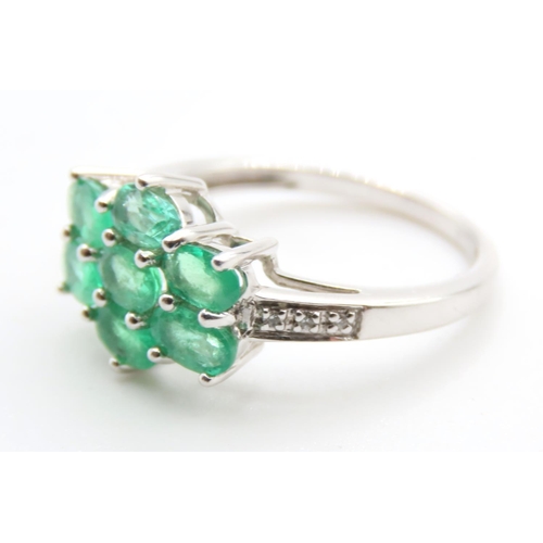 1433 - Seven Stone Emerald Cluster Ring Mounted on 9 Carat White Gold Further Diamonds Set to Shoulders Rin... 