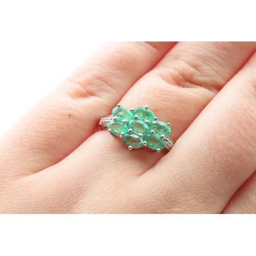 1433 - Seven Stone Emerald Cluster Ring Mounted on 9 Carat White Gold Further Diamonds Set to Shoulders Rin... 