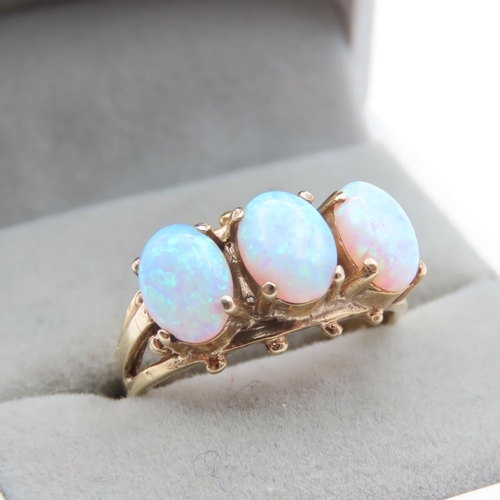 1435 - Three Stone Opal Ring Set in 9 Carat Yellow Gold Ring Size P