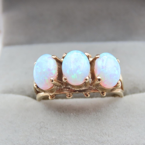 1435 - Three Stone Opal Ring Set in 9 Carat Yellow Gold Ring Size P