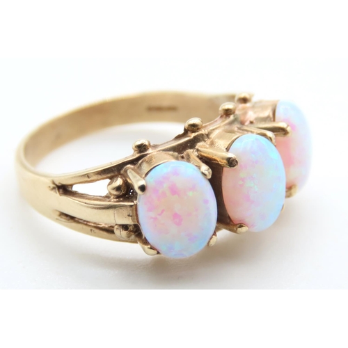 1435 - Three Stone Opal Ring Set in 9 Carat Yellow Gold Ring Size P