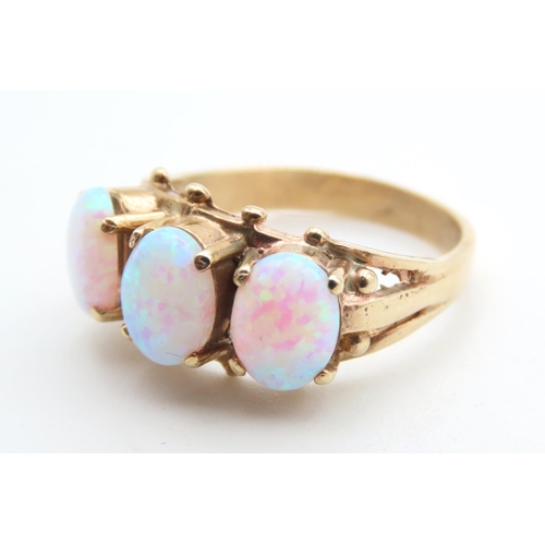 1435 - Three Stone Opal Ring Set in 9 Carat Yellow Gold Ring Size P