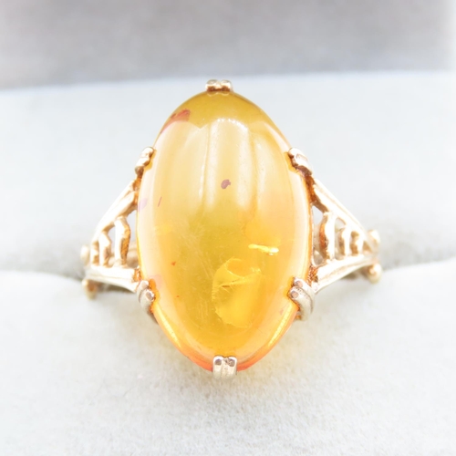 1448 - Basket Set Amber Statement Ring Mounted on 9 Carat Yellow Gold Ring Size R and a Half