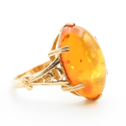 1448 - Basket Set Amber Statement Ring Mounted on 9 Carat Yellow Gold Ring Size R and a Half