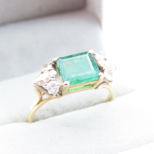 1451 - Emerald And Diamond Ring Attractively Detailed Mounted in 18 Yellow Gold Ring Size V