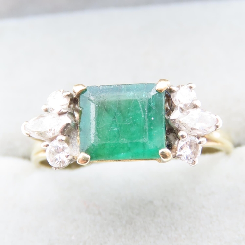 1451 - Emerald And Diamond Ring Attractively Detailed Mounted in 18 Yellow Gold Ring Size V