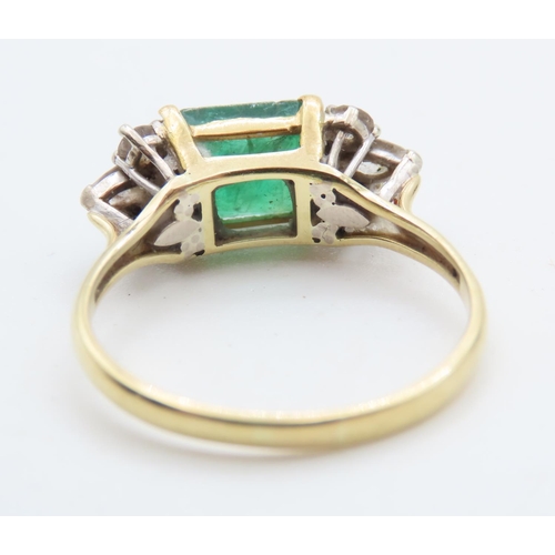 1451 - Emerald And Diamond Ring Attractively Detailed Mounted in 18 Yellow Gold Ring Size V