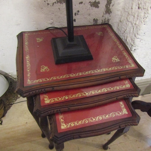 36 - Set of Three Graduated Occasional Tables Inset Burgundy Leather Tops Gilt Tooled Shaped Supports Lar... 