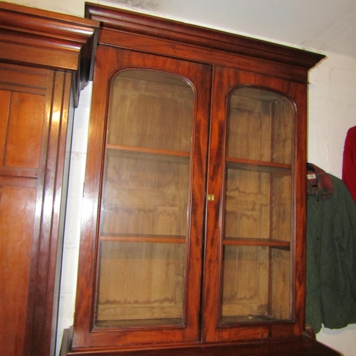 51 - William IV Mahogany Two Door Bookcase with Central Drawer Above Cupboard Base Approximately 42 Inche... 