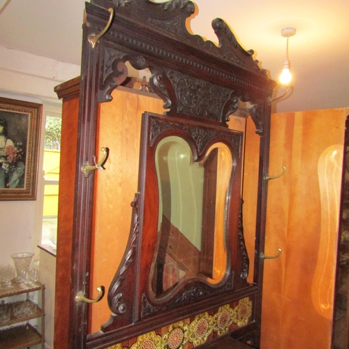 70 - Victorian Mahogany Mirrored Back Hallstand Tiled Frieze Brass Hooks Approximately 4ft Wide x 7ft Hig... 