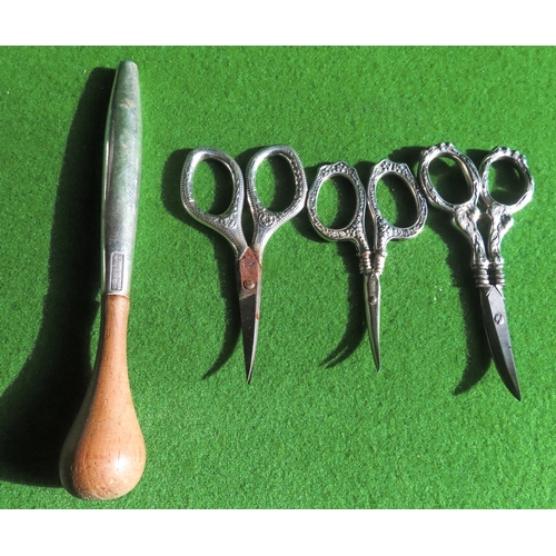 Three Silver Handled Scissors and Another Implement Silver with Turned Handle Four Pieces in Lot