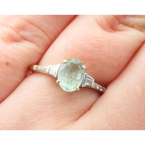 116 - Aquamarine Centerstone Ring Mounted in 14 Carat White Gold with Further Tapered Baguette and Round D... 