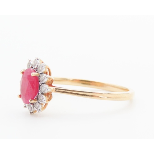 138 - Ruby and Diamond Ladies Cluster Ring Mounted in 18 Carat Yellow Gold Ring Size O and a Half Ruby App... 