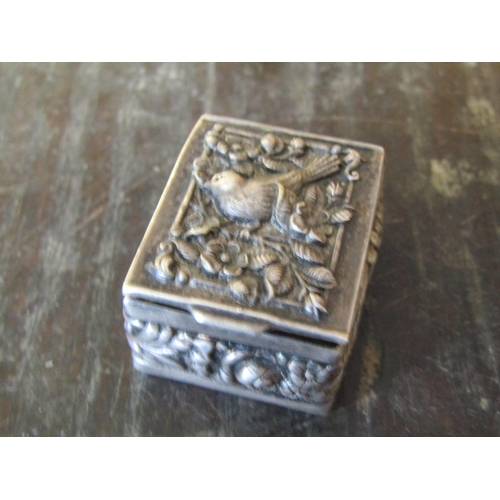 1386 - Silver Pill Box Avian Motif Embossed Decoration Approximately 5 cm Long x 4 cm Wide Hinged Cover