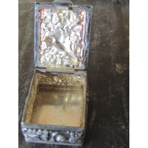 1386 - Silver Pill Box Avian Motif Embossed Decoration Approximately 5 cm Long x 4 cm Wide Hinged Cover