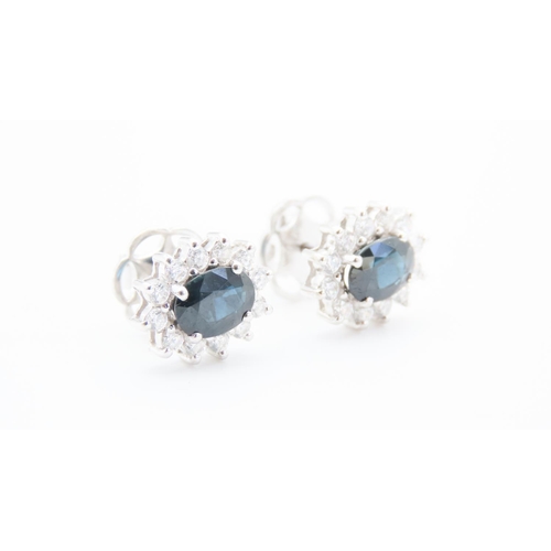 141 - Pair of Sapphire and Diamond Set Cluster Earrings Mounted in 18 Carat White Gold Diamond Carat Weigh... 