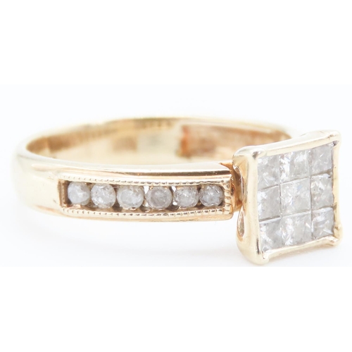 147 - Nine Princess Cut Diamond Ring Bezel Set in 9 Carat Yellow Gold with Further Round Diamonds Set to B... 