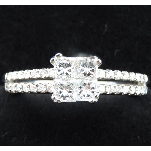 156 - Four Square Cut Diamond Ring Set in 18 Carat White Gold with Further Diamonds Set to Band Ring Size ... 