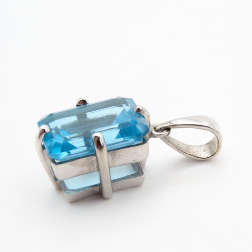 162 - Emerald Cut Blue Topaz Pendant Set in 9 Carat White Gold 2cm Drop Further Set on 9 Carat White Gold ... 