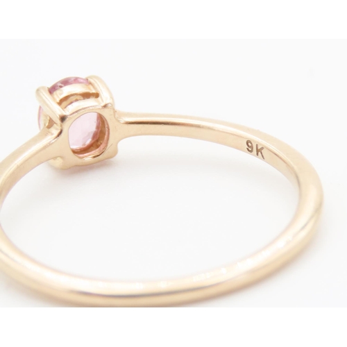 173 - Four Claw Set Pink Sapphire Solitaire Mounted in 9 Carat Yellow Gold Ring Size L and a Half