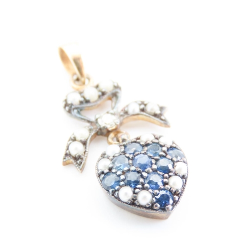 175 - Sapphire and Seed Pearl Set Heart and Bow Pendant Mounted in Silver Gilt and 9 Carat Yellow Gold 2cm... 