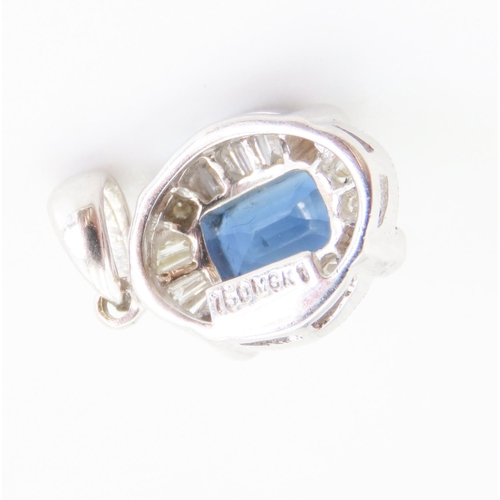 177 - Emerald Cut Sapphire Pendant with Tempered Baguette Diamond Surround Mounted in 18 Carat White Gold ... 