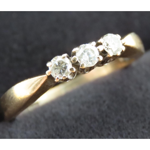 181 - Three Stone Basket Set Diamond Ring Mounted in 9 Carat Yellow Gold Ring Size M