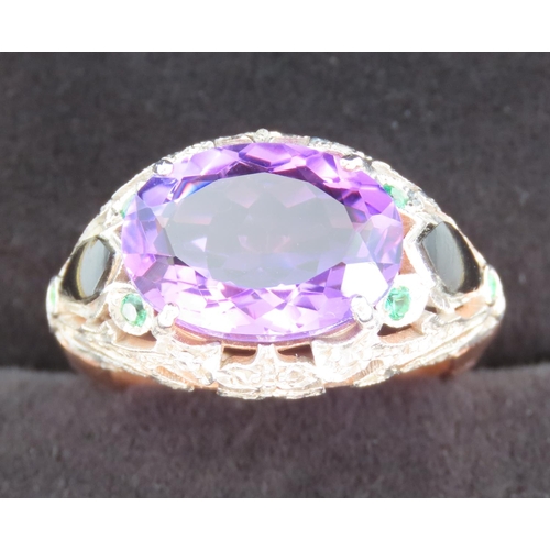 187 - Amethyst Four Claw Set Ladies Ring Diamond Decorated Surrounds with Inset Emeralds 9 Carat Rose Gold... 