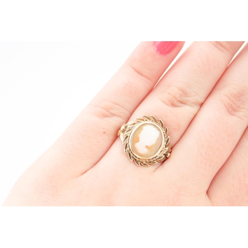 193 - Ladies Cameo Set Ring Mounted on 9 Carat Yellow Gold Band Laurel Motif Outer Decoration Ring Size N ... 