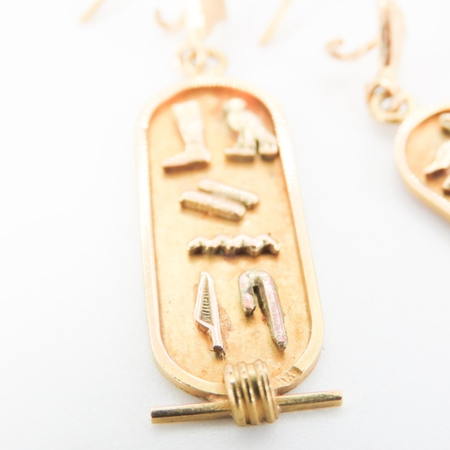 195 - Pair of 18 Carat Yellow Gold Hieroglyphic Drop Form Earrings Attractively Detailed Each 5cm High