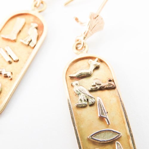 195 - Pair of 18 Carat Yellow Gold Hieroglyphic Drop Form Earrings Attractively Detailed Each 5cm High