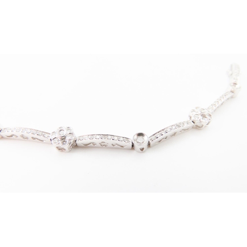 197 - Daisy Motif Diamond Set Bracelet Mounted 18 Carat White Gold Interlinking Form Attractively Detailed... 