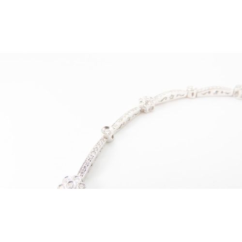 197 - Daisy Motif Diamond Set Bracelet Mounted 18 Carat White Gold Interlinking Form Attractively Detailed... 