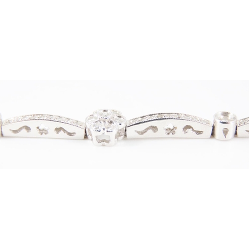 197 - Daisy Motif Diamond Set Bracelet Mounted 18 Carat White Gold Interlinking Form Attractively Detailed... 