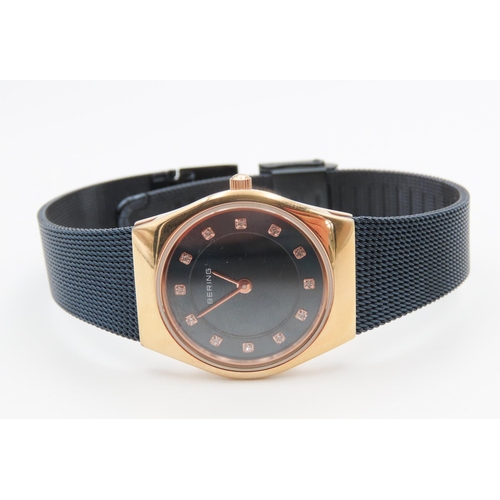 213 - Rose Gold and Navy Ladies BERING Wristwatch