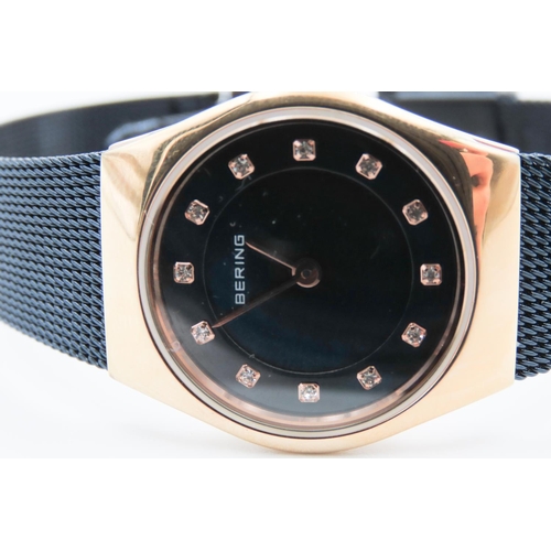 213 - Rose Gold and Navy Ladies BERING Wristwatch