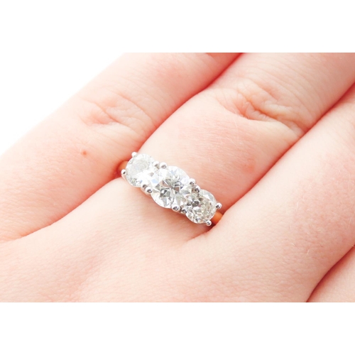 227 - Three Stone Trellis Set Diamond Ring Set in 18 Carat White Gold Further Mounted on 18 Carat Yellow G... 