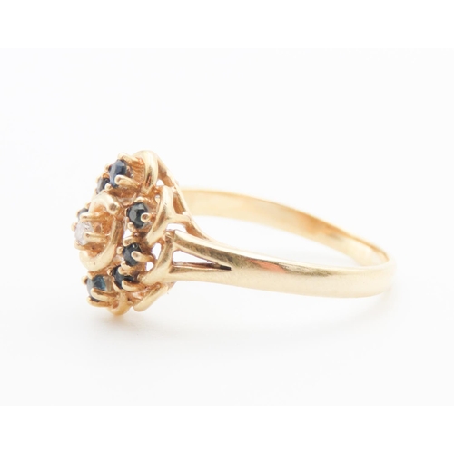 242 - 18 Carat Yellow Gold Sapphire Set Ladies Cluster Ring Attractively Detailed Ring Size R