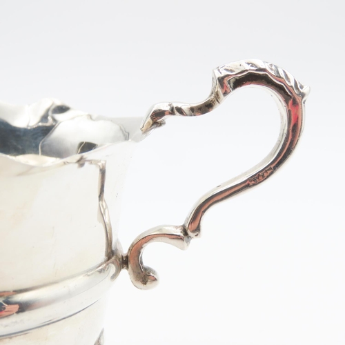 250 - Silver Cream Jug Shaped Form Handle above Further Shaped Supports  8cm High