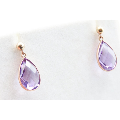 257 - Pair of Amethyst Set Tear Drop Earrings Mounted in 9 Carat Yellow Gold 2cm Drop