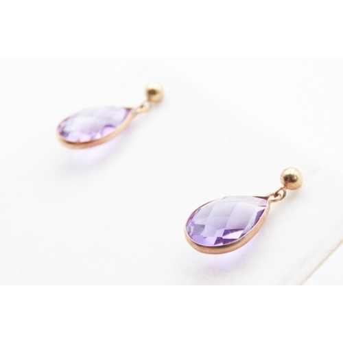 257 - Pair of Amethyst Set Tear Drop Earrings Mounted in 9 Carat Yellow Gold 2cm Drop