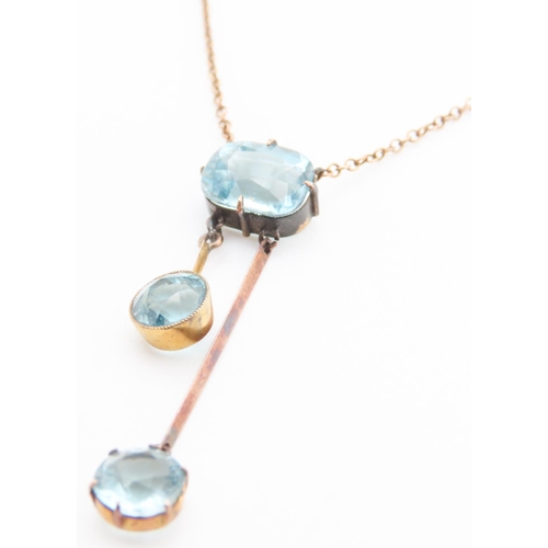 264 - Three Stone Aquamarine Set Necklace Mounted in 9 Carat Yellow Gold chain 40cm Long Pendant 4cm