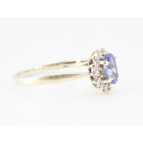 273 - Tanzanite and Diamond Set Cluster Ring Mounted in 14 Carat Yellow Gold Total Tanzanite Carat Weight ... 