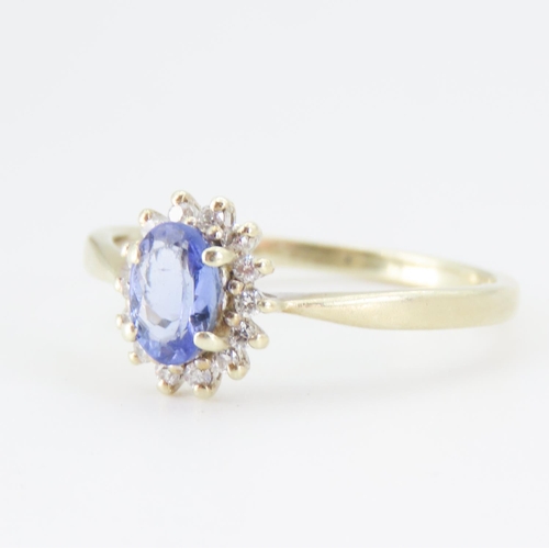 273 - Tanzanite and Diamond Set Cluster Ring Mounted in 14 Carat Yellow Gold Total Tanzanite Carat Weight ... 